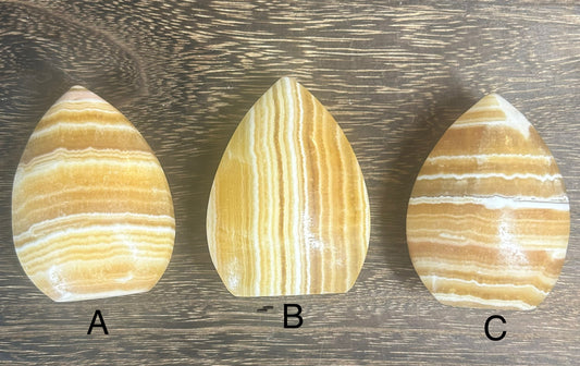 Orange Calcite Banded Teardrop /Flame Carvings